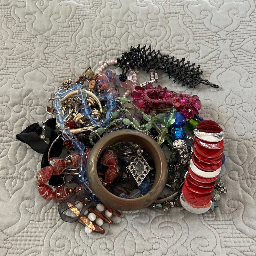 Jewelry grab bag with bracelets, chokers, pendants, and more for DIY or crafts